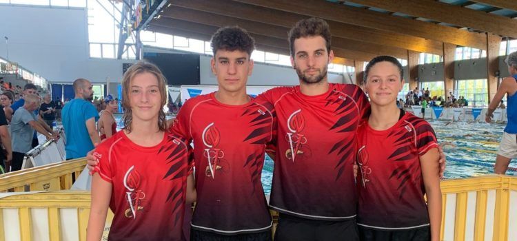 Ariadna Martorell, Joan Montserrat i Naiara Pascondea (CN Vinaròs), en el Campionat Nacional Infantil